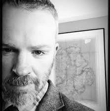 A portrait of J.D. Fennell