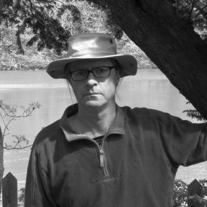 A portrait of Mark Sennen